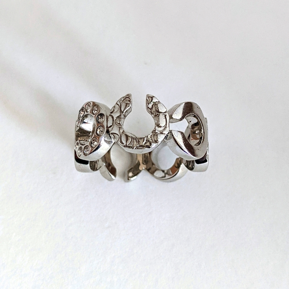 Coach sterling silver script eternity ring. Size 7